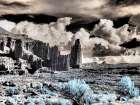 USA-Utah Infrared of Fisher Towers with large clouds Art Print